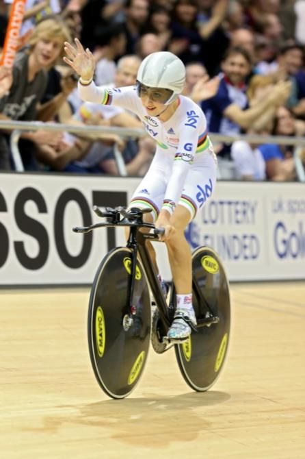 Britain's Laura Trott salutes the crowd after she won the women's omnium event