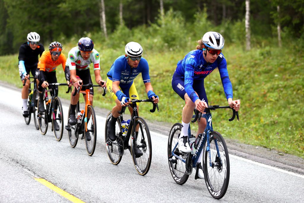 BRONNOYSUND NORWAY AUGUST 12 LR Stephen Bassett of United States and Team Human Powered Health Polka Dot Mountain Jersey Aaron Van Poucke of Belgium and Team Sport Vlaanderen Baloise and Liam Johnston of Australia and Team Trinity Racing compete in the breakaway during the 9th Arctic Race Of Norway 2022 Stage 2 a 1543km stage from Mosjen to Brnnysund ArcticRace on August 12 2022 in Bronnoysund Norway Photo by Michael SteeleGetty Images
