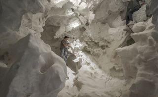 Visitors can climb into the dreamy space, which makes a point about experiencing architecture