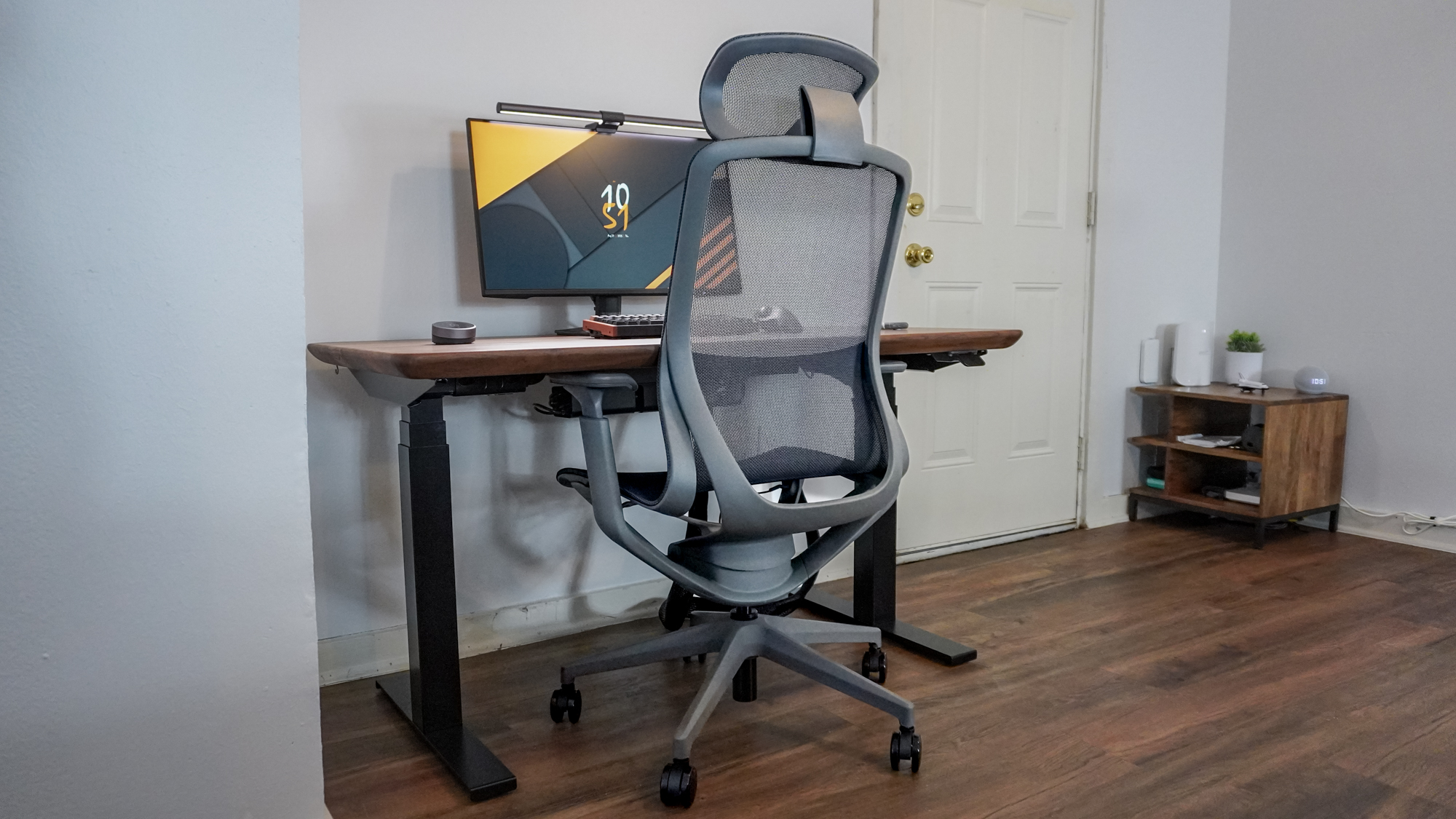 The Branch Aire Chair seen from behind pushed into a desk