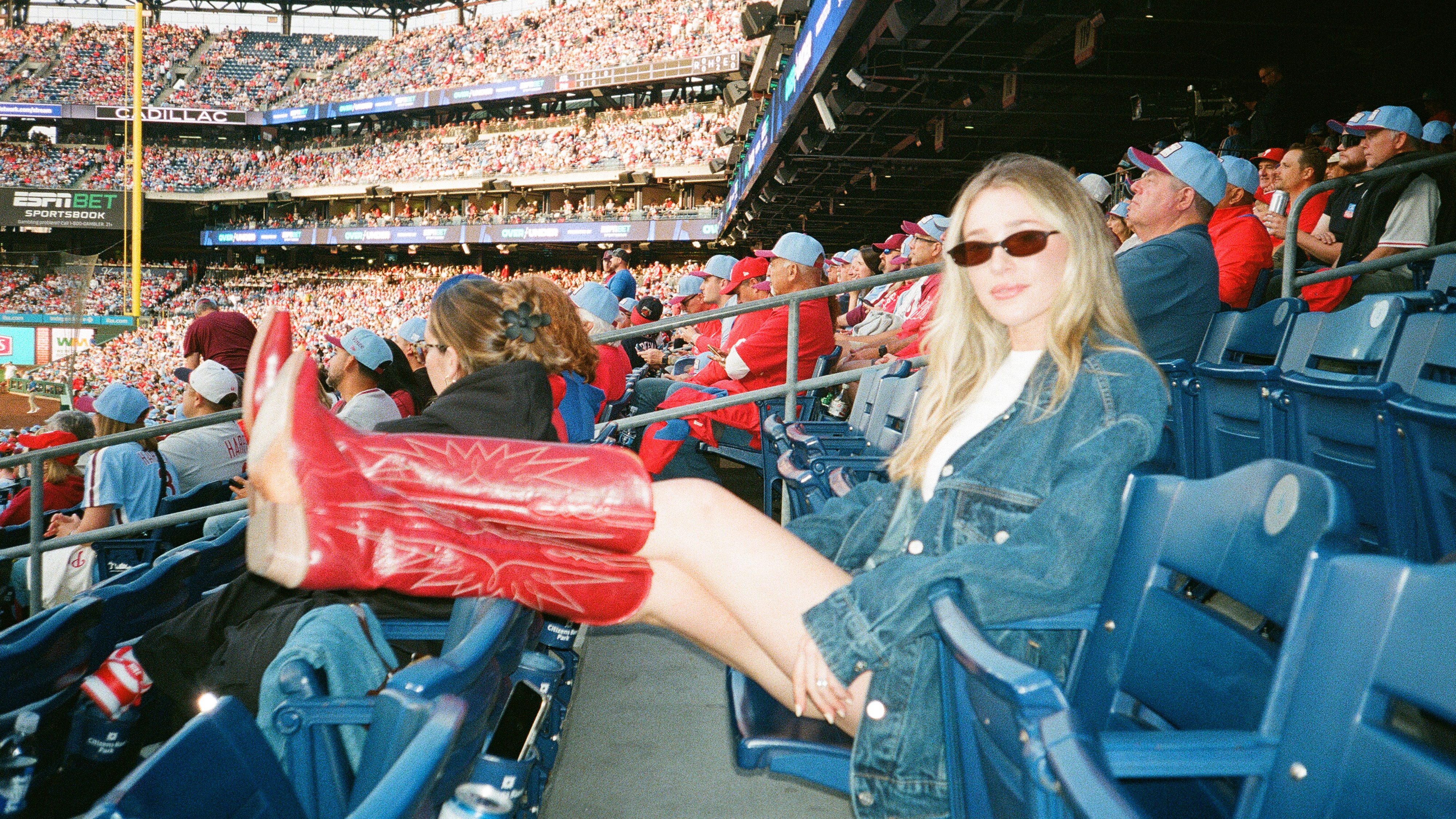 payton sartain ross attending a baseball game