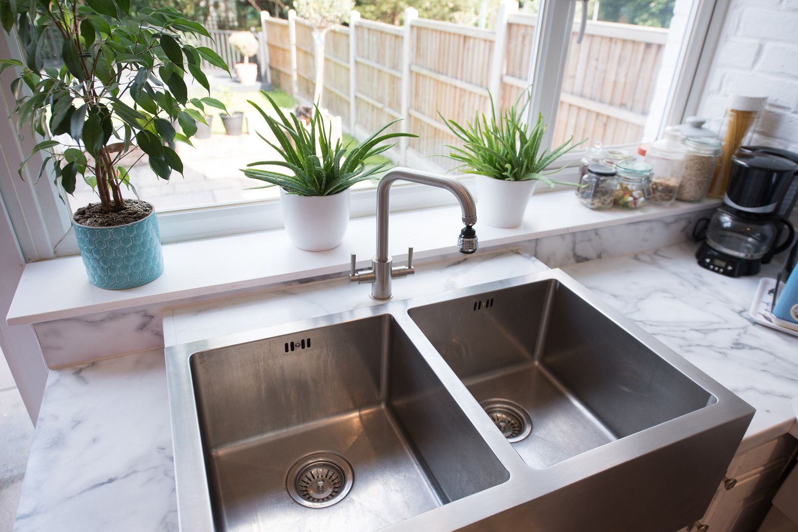 How to clean a stainless steel sink using baking soda, vinegar, club soda and more Real Homes