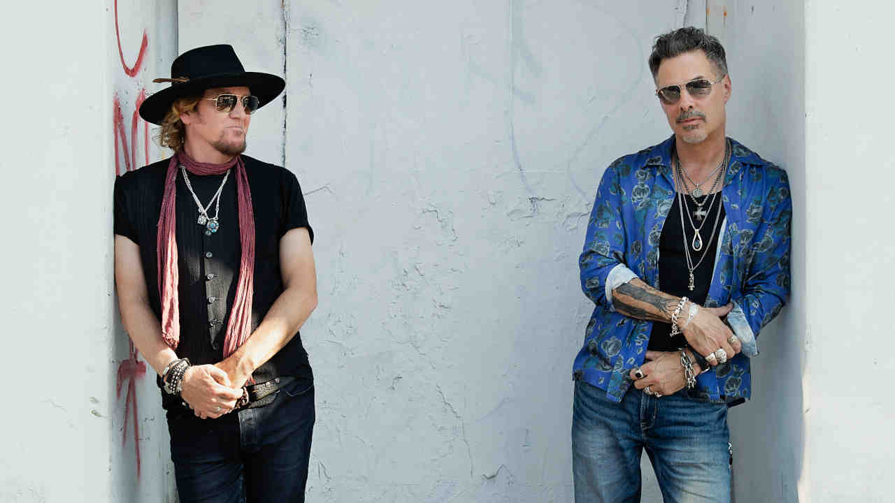 Adrian Smith and Richie Kotzen posing for a photograph