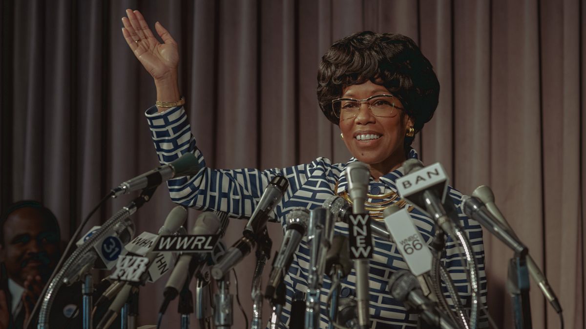 Regina King as Shirley Chisholm behind a podium in Shirley