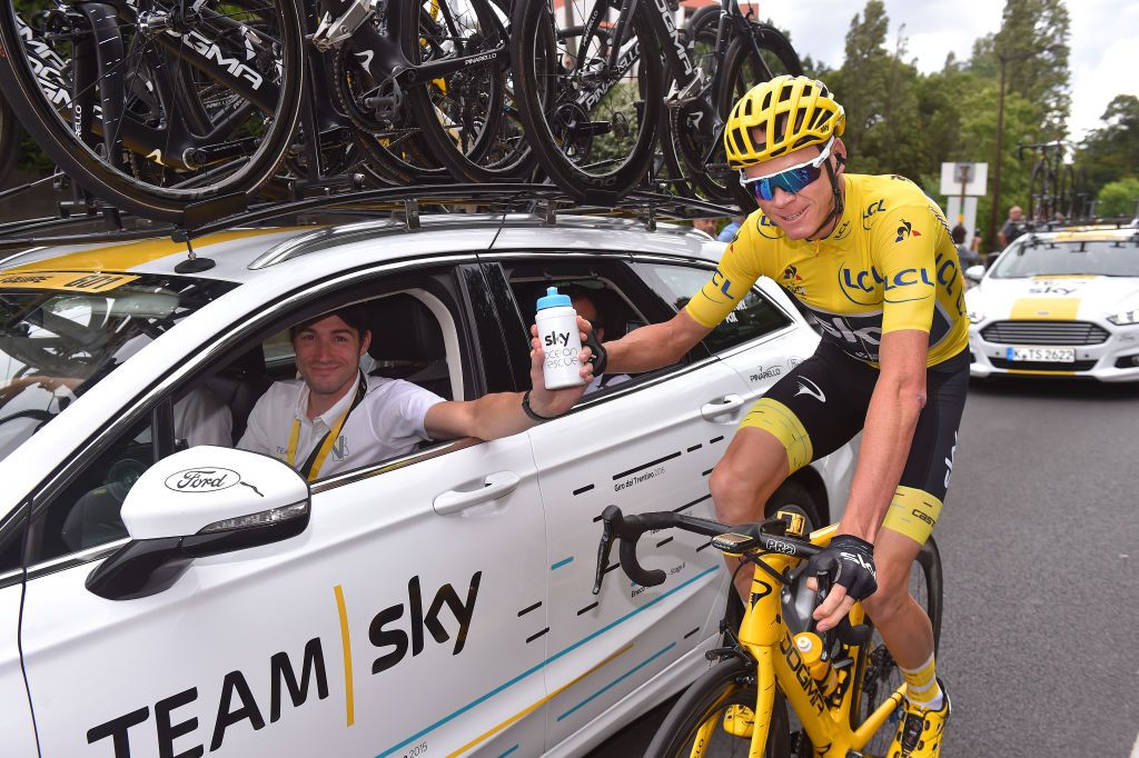 Team Sky sports director Nicolas Portal and Chris Froome celebrate Froome’s fourth Tour de France together on the final stage of the 2017 race 