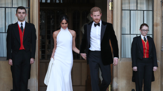 Duchess of Sussex and Prince Harry, Duke of Sussex leave Windsor Castle after their wedding to attend an evening reception at Frogmore House, hosted by the Prince of Wales on May 19, 2018 in Windsor, England