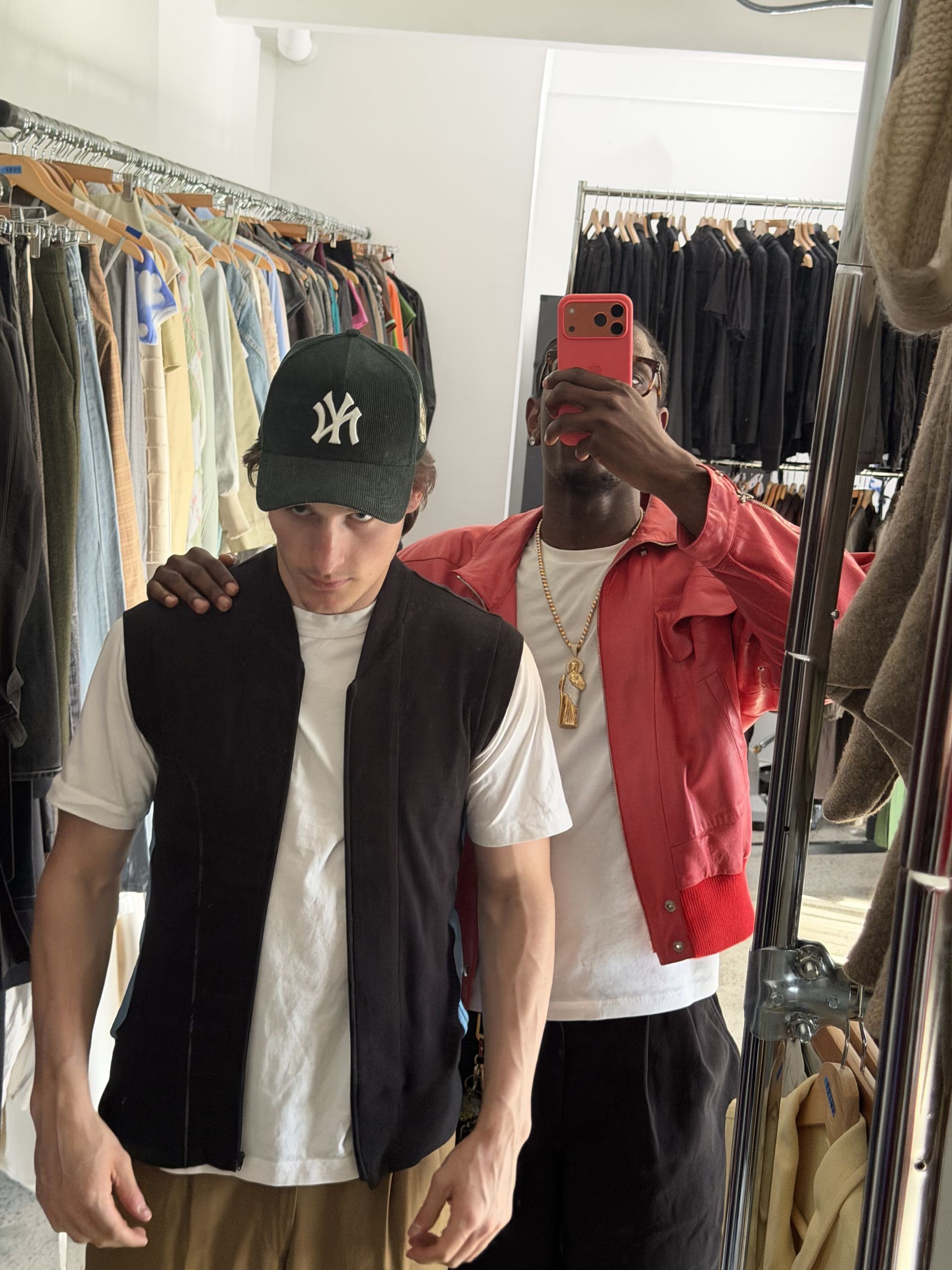 Knicks player Tyler Kolek with stylist Olivier Rogers.