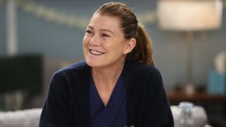 Ellen Pompeo smiling as Meredith Grey in Grey's Anatomy