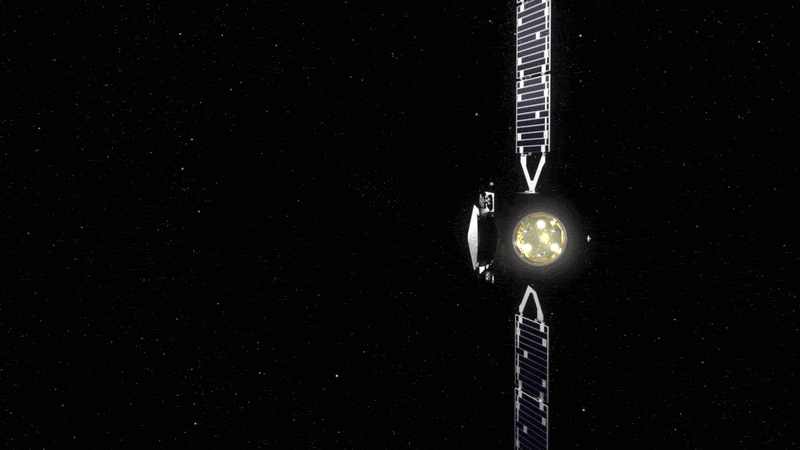 a cube-shaped spacecraft with two wing-like solar panels glides across a starry black background