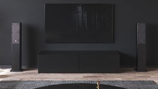 the audio pro a36 floorstanding speakers either side of a TV