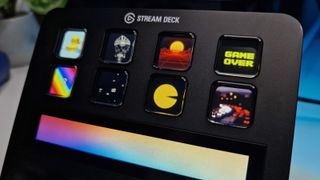 A photo of the Stream Deck + buttons that have various animated gifs on the screens