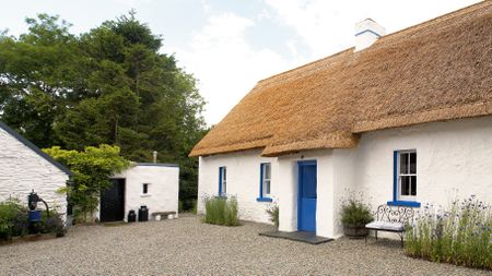 lime washed irish cottage exterior