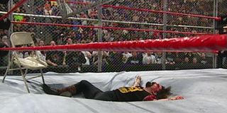Mick Foley after crashing into the ring at No Way Out 2000