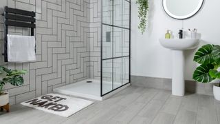 wood effect porcelain flooring with walk-in shower