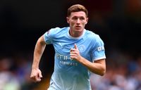 Manchester City's Elliot Anderson running.