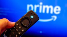 Amazon Fire TV Stick remote – with Prime Video logo in the background