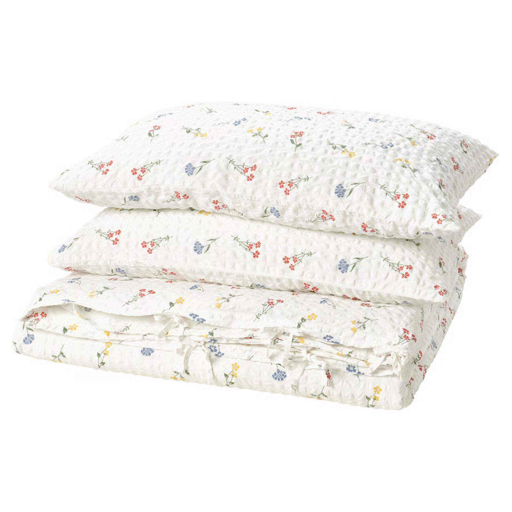IKEA floral white PILDV&amp;Auml;RGMAL Duvet cover and pillowcases folded in a pile