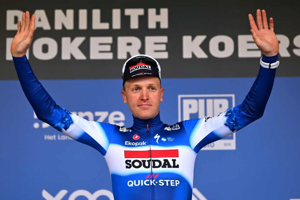 NOKERE BELGIUM MARCH 13 Tim Merlier of Belgium and Team Soudal QuickStep celebrates at podium as race winner during the 78th Danilith Nokere Koerse 2024 Mens Elite a 1881km one day race from Deinze to Nokere UCIWT on March 13 2024 in Nokere Belgium Photo by Luc ClaessenGetty Images