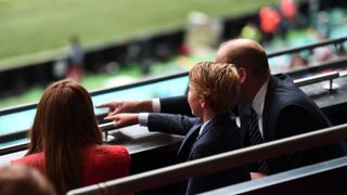 : Prince William, President of the Football Association along with Catherine, Duchess of Cambridge and Prince George during the UEFA Euro 2020 Championship Round of 16 match between England and Germany at Wembley Stadium on June 29, 2021 in London, England.