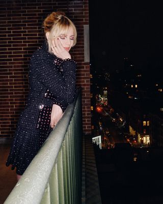 Lucy Boynton getting ready at her hotel wearing chanel jewelry and makeup