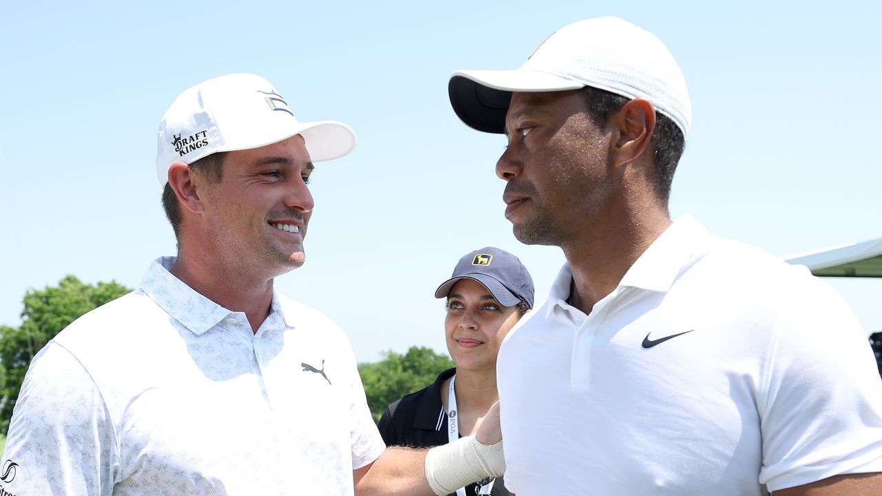 Bryson DeChambeau and Tiger Woods talking at the 2022 PGA Championship