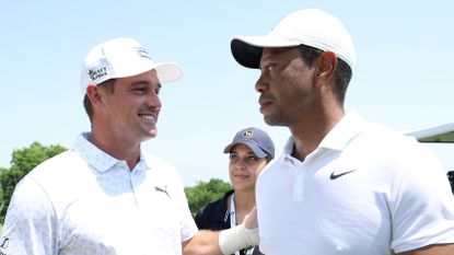 Bryson DeChambeau and Tiger Woods talking at the 2022 PGA Championship