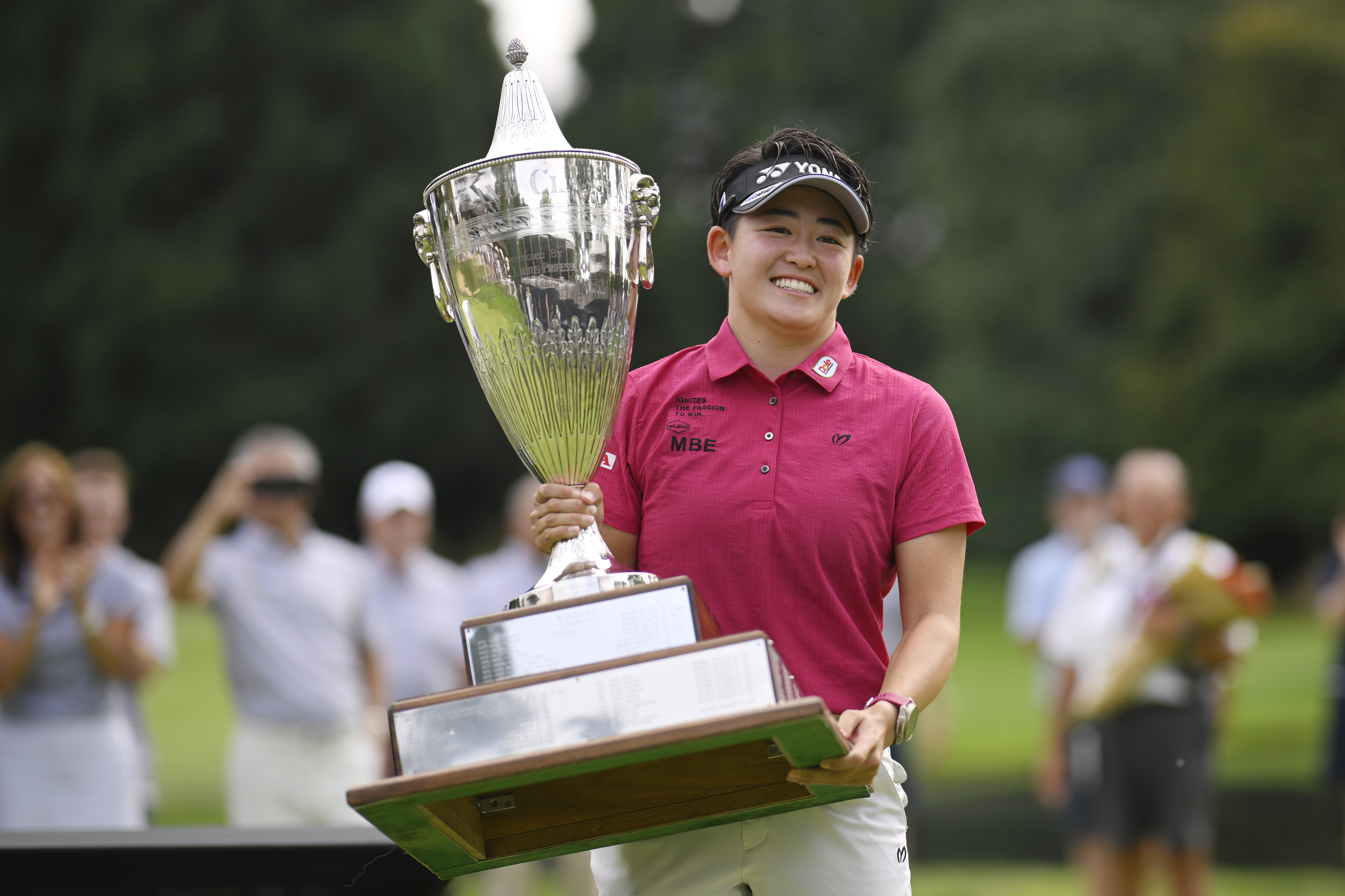 Japan's Akie Iwai holds up the Standard Portland Classic trophy following her win in 2025
