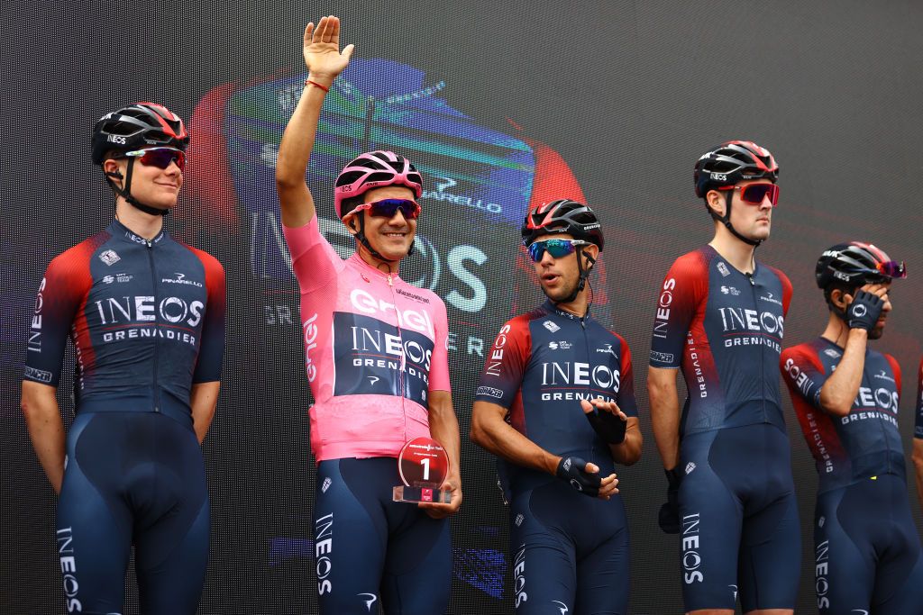 COGNE ITALY MAY 22 LR Ben Tulett of United Kingdom Richard Carapaz of Ecuador Pink Leader Jersey and Richie Porte of Australia and Team INEOS Grenadiers during the team presentation prior to the 105th Giro dItalia 2022 Stage 15 a 177km stage from Rivarolo Canavese to Cogne 1622m Giro WorldTour on May 22 2022 in Cogne Italy Photo by Michael SteeleGetty Images