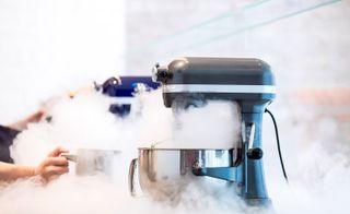 Food mixers with fog and mist coming out as they make ice-cream using liquid nitrogen
