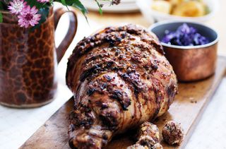 Roast leg of lamb with date and herb stuffing