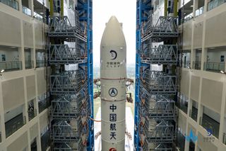 A Chinese Long March 5 rocket topped by the nation's Chang'e 5 lunar sample-return mission rolls out to the pad at Wenchang Space Launch Center in Hainan province on Nov. 17, 2020. Launch is targeted for Nov. 24.