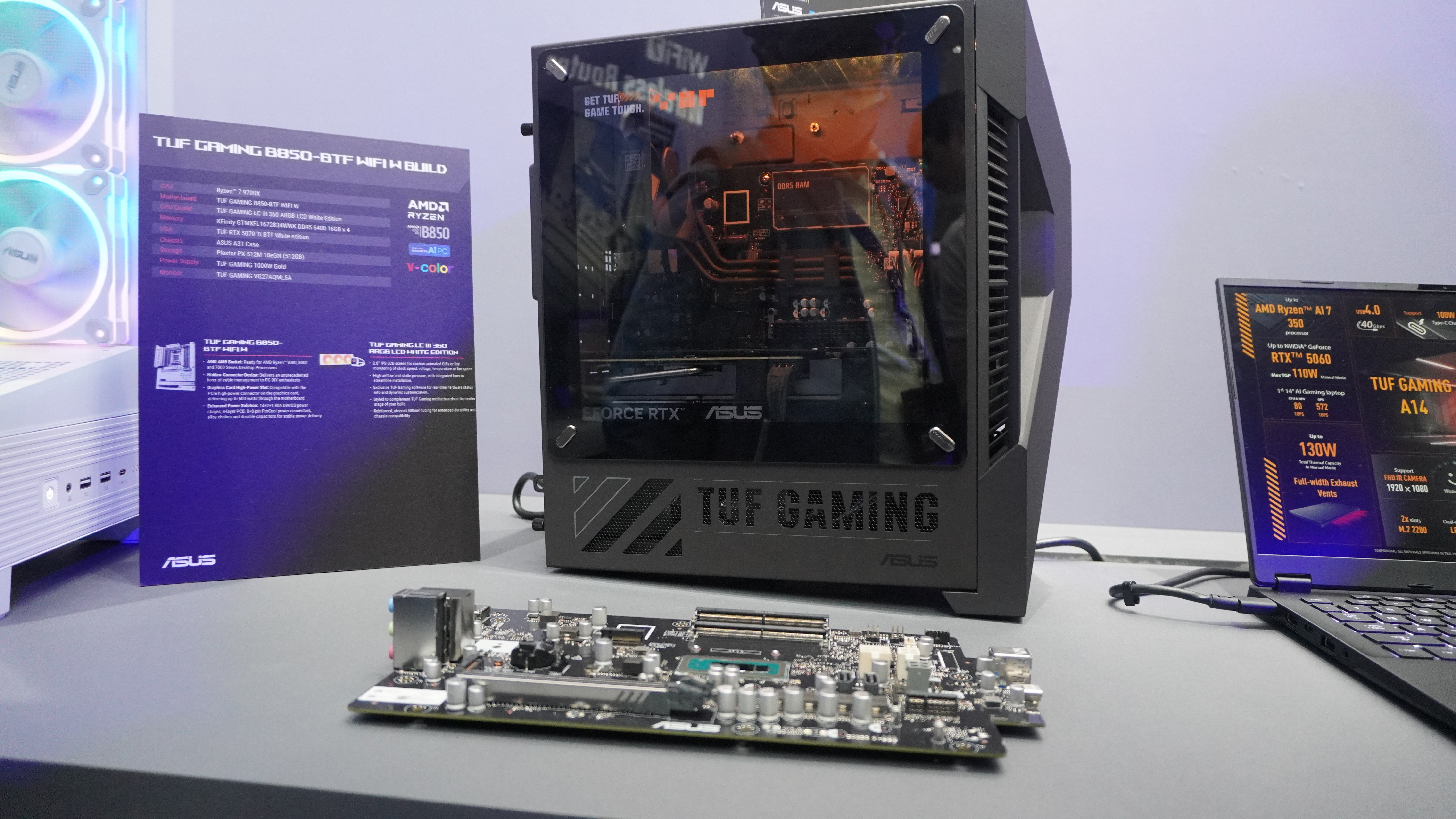 Asus TUF Gaming T500 on table with motherboard in front