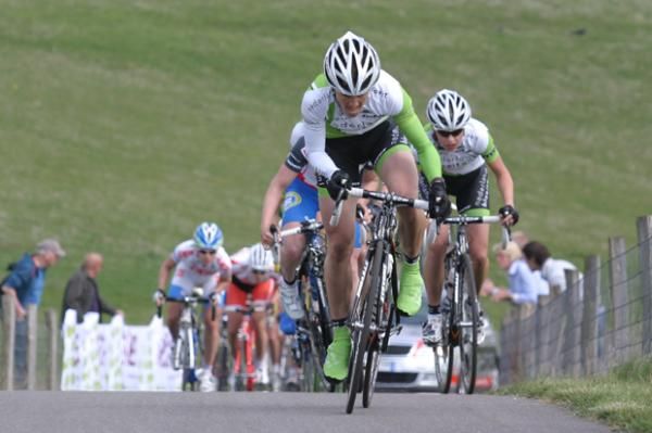 Marieke Van Wanroij (Nederland Bloeit) heads across the climb.