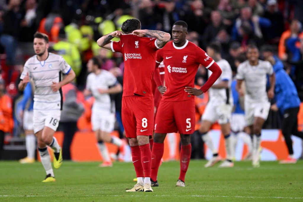 Dominik Szoboszlai of Liverpool reacts after Mario Pasalic of Atalanta BC scores his team&#039;s third goal during the UEFA Europa League 2023/24 Quarter-Final first leg match between Liverpool FC and Atalanta at Anfield on April 11, 2024 in Liverpool, England.