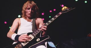 Phil Collen live in 1984, playing an Ibanez Destroyer