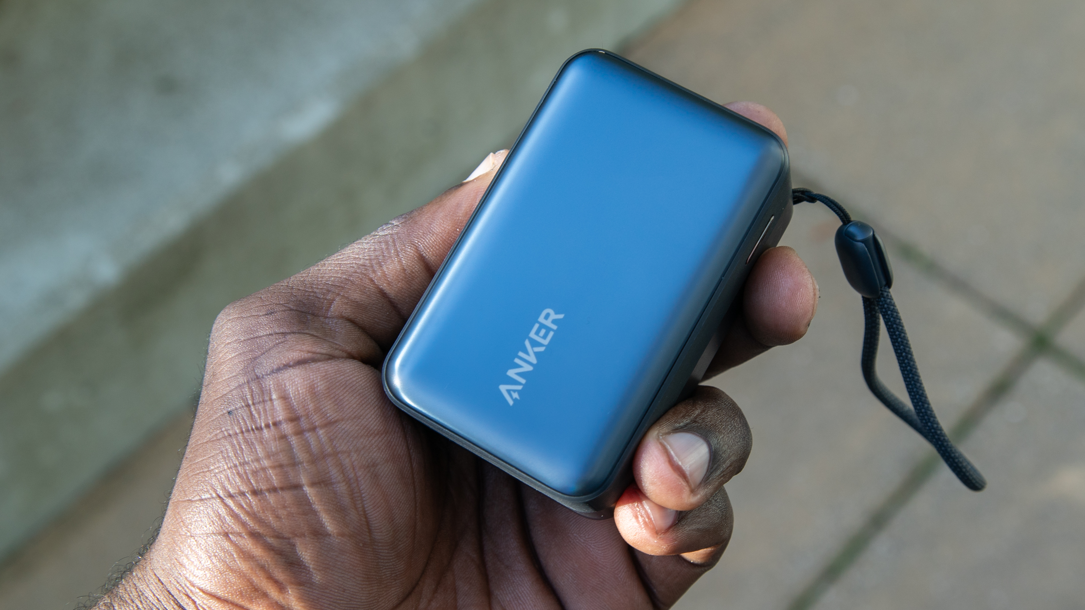The Anker Nano Power Bank (A1638) in hand