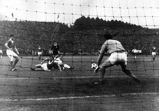 Bayern Munich's Gerd Muller takes a shot at goal in the 1967 European Cup Winners' Cup final against Rangers in Nuremberg.