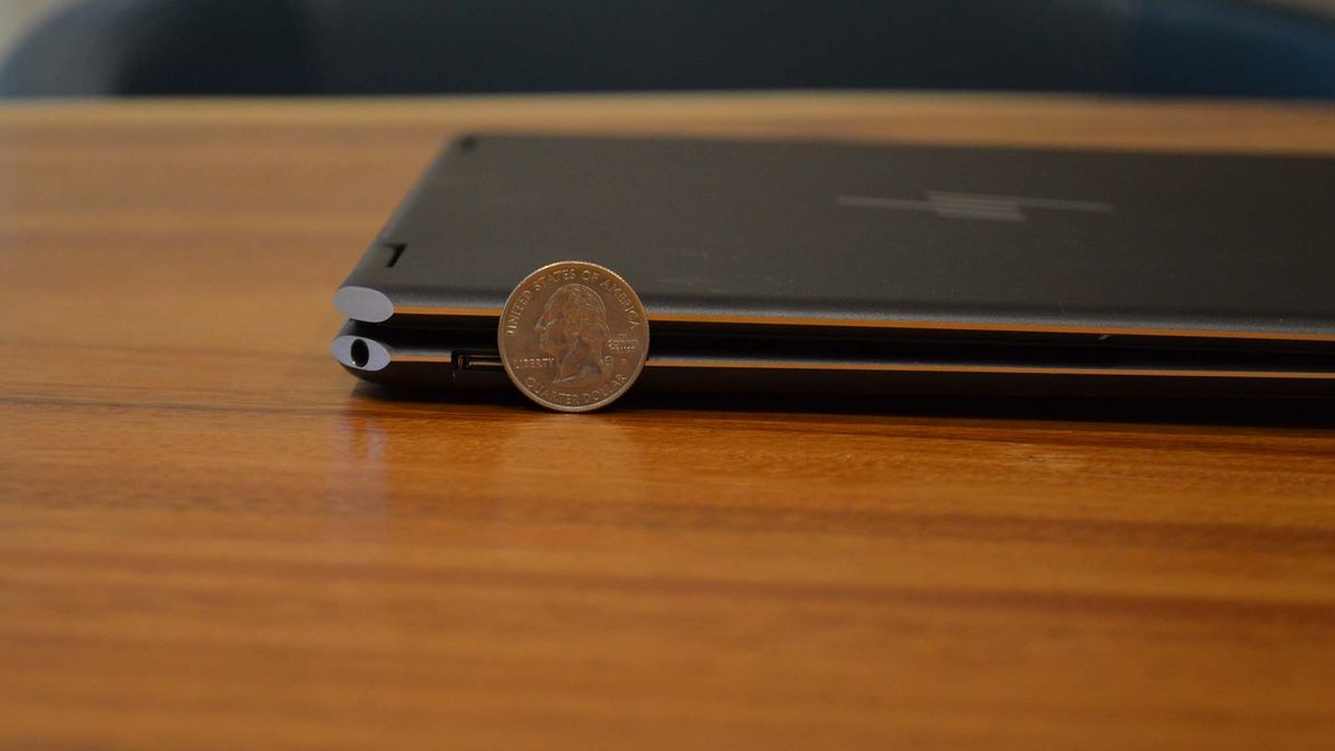 An HP Spectre x360 2022 on a wooden table
