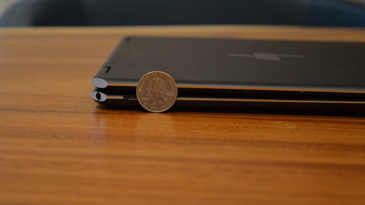 An HP Spectre x360 2022 on a wooden table