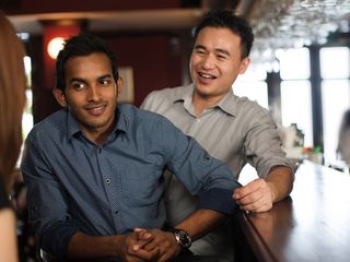 Two men out together at a bar. 