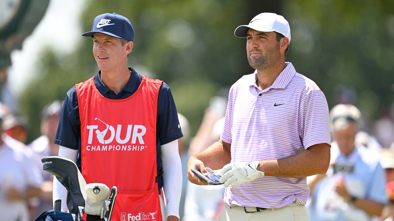 Ted Scott and Scottie Scheffler mull over a shot at the 2024 Tour Championship