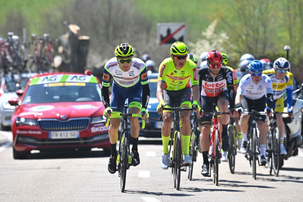 LtoR Belgian cyclist Loic Vliegen of Intermarche WantyGobert Materiaux Dutch cyclist Mathijs Paasschens of BingoalWB and Polish cyclist Tomasz Marczynski of Lotto Soudal compete during the LiegeBastogneLiege one day cycling race from Liege to Liege on April 25 2021 Belgium OUT Photo by ERIC LALMAND Belga AFP Belgium OUT Photo by ERIC LALMANDBelgaAFP via Getty Images