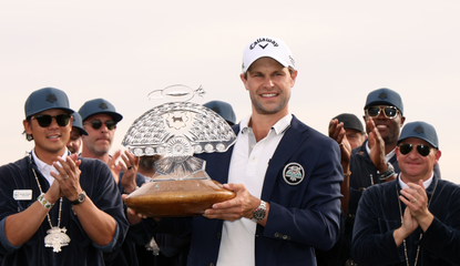 Thomas Detry holds the WM Phoenix Open trophy