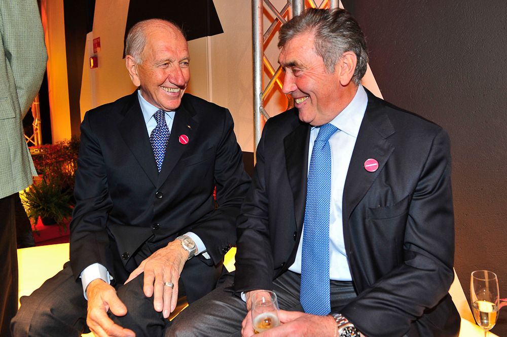 Vittorio Adorni and Eddy Merckx talk a recent opening of an exhibition about the Faema cycling teams.