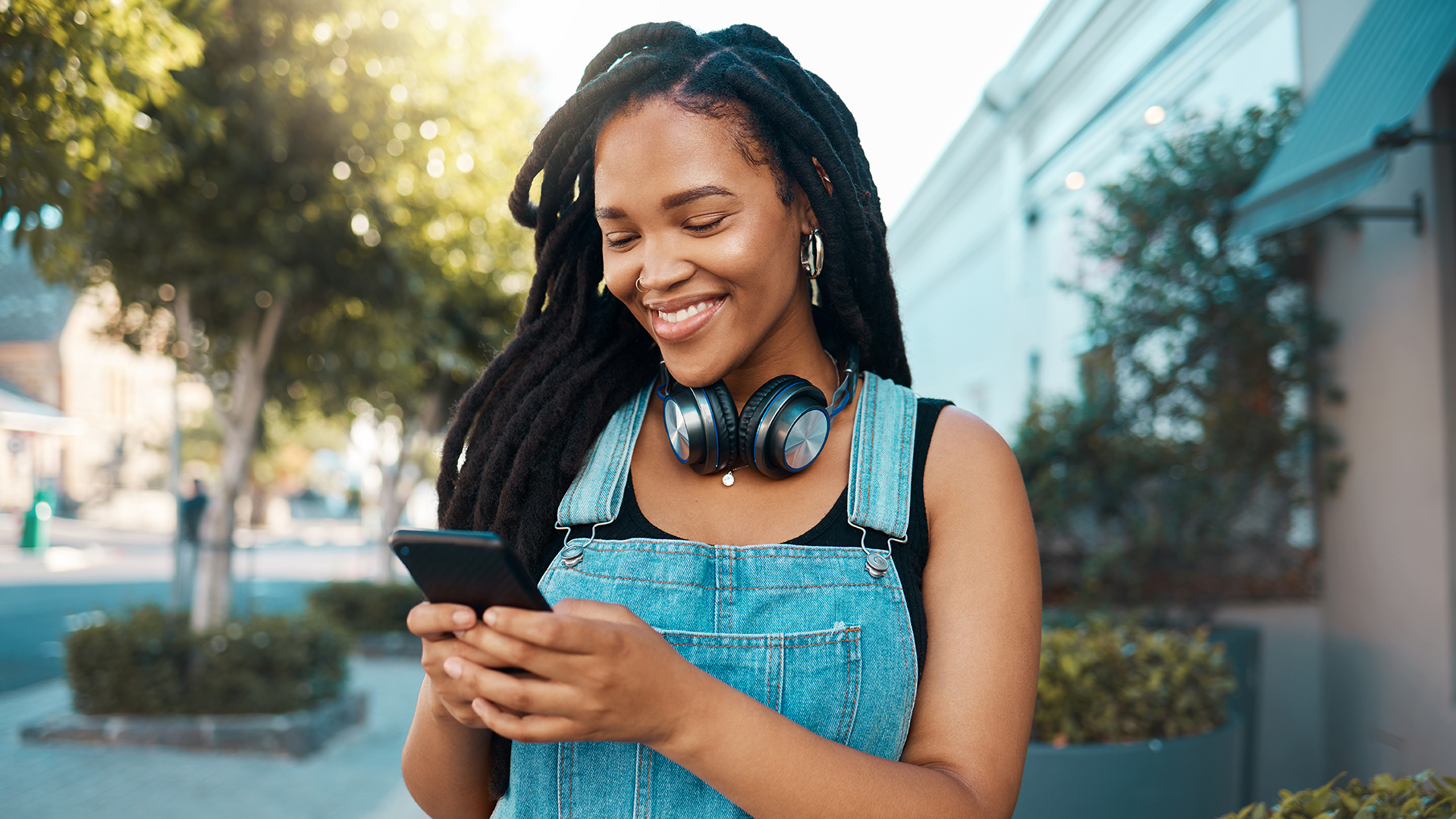 Girl on her phone looking for a new job