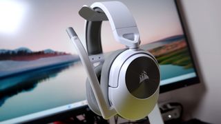 Corsair HS55 Wireless gaming headset in front of a monitor.