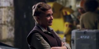 Princess Leia (Carrie Fisher) crosses her arms and looks dubious in a scene from 'The Force Awakens'
