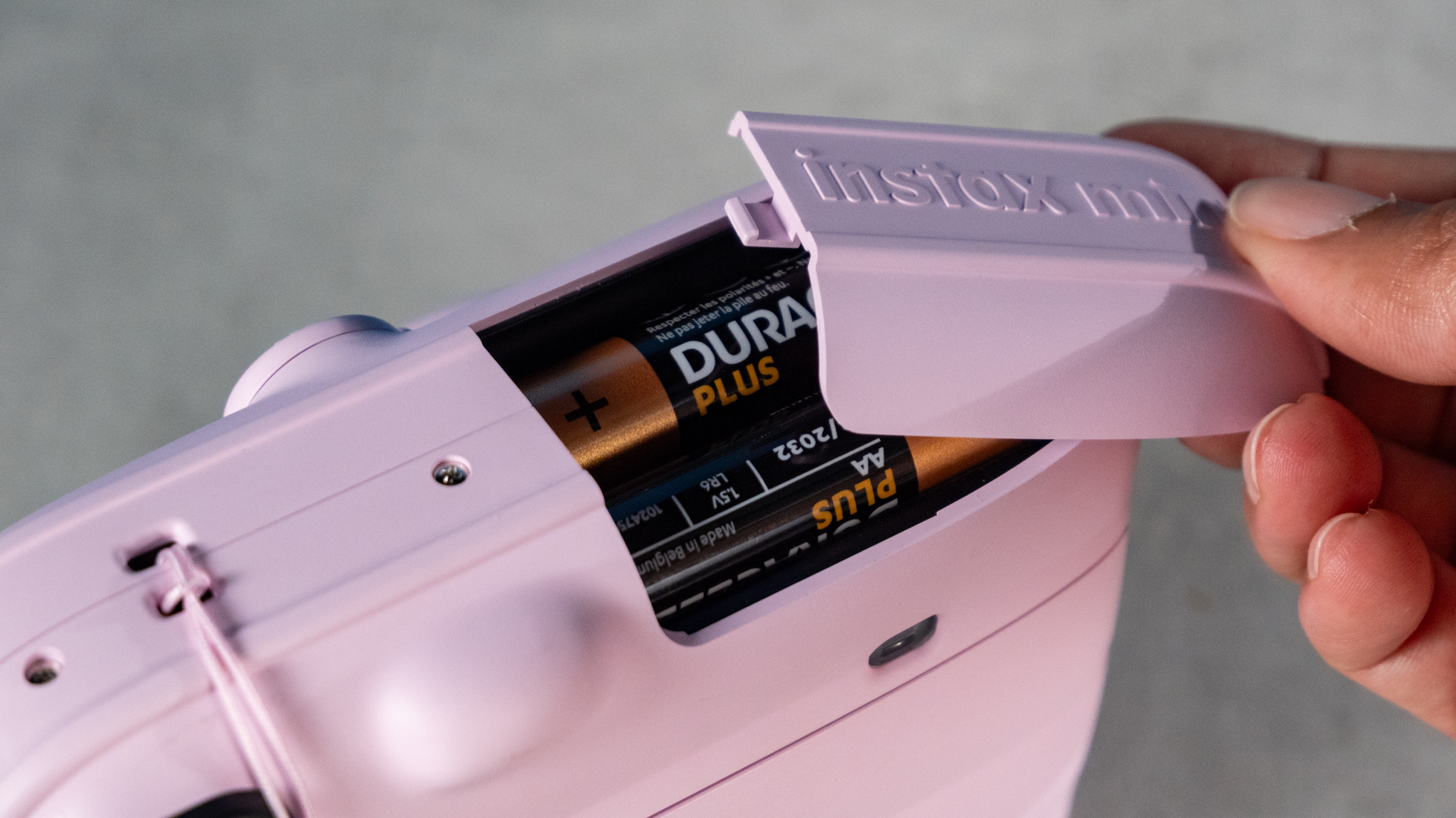 A Candy Pink Fujifilm Instax mini 13 instant camera