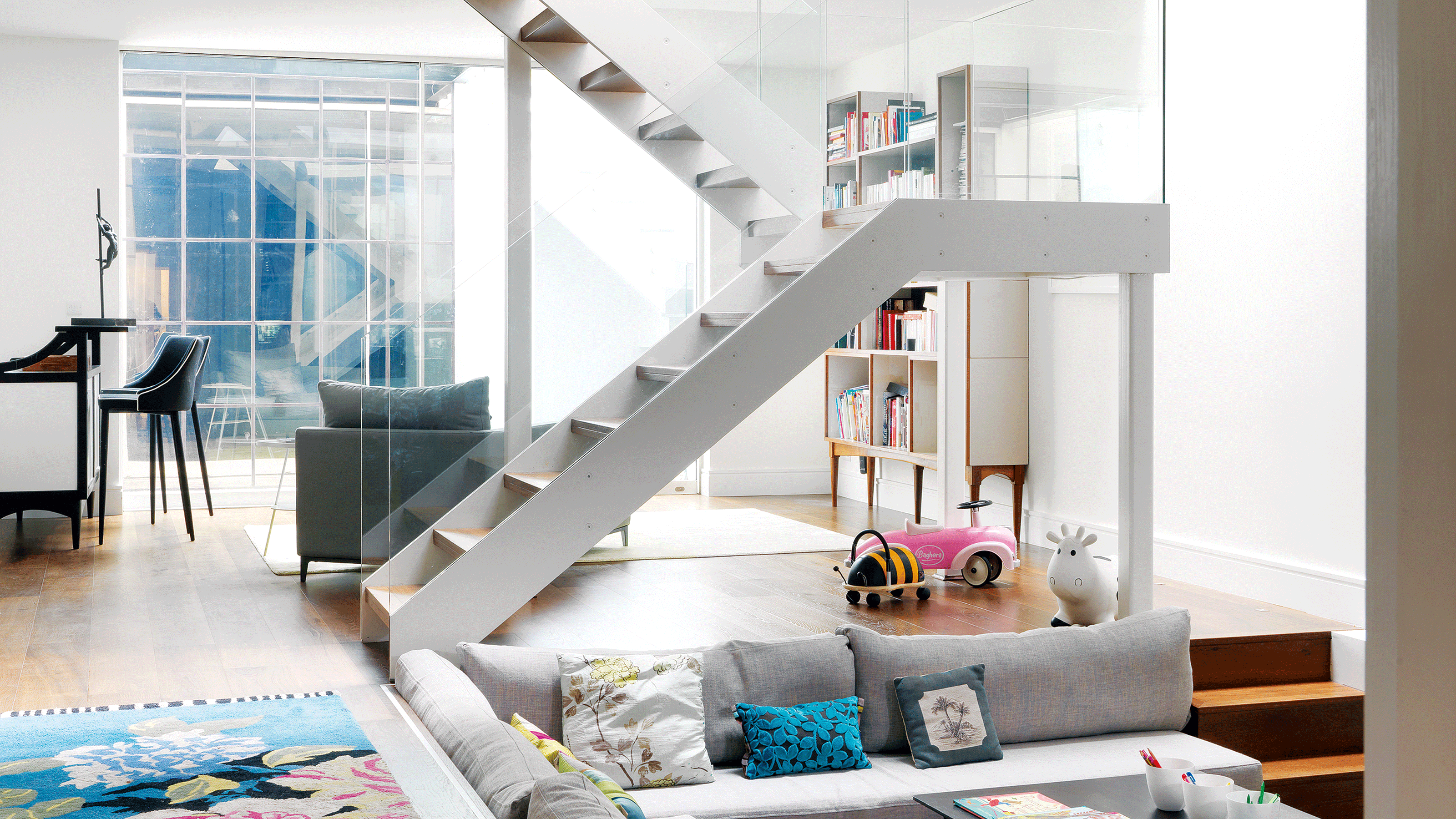 White open stair case in living room 