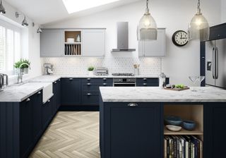l shaped kitchen with dark cupboars and light flooring by magnet